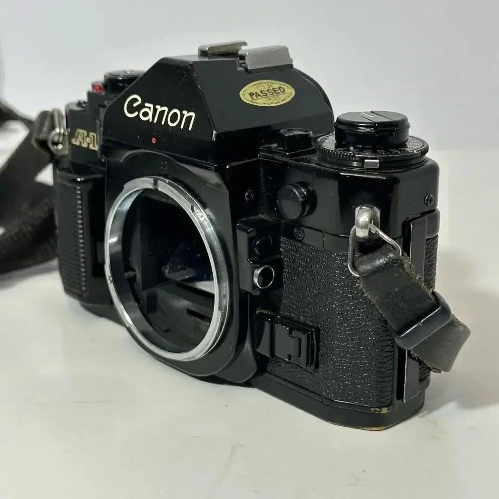 Vintage Canon A-1 Black 35 mm SLR with Strap/ Body Only